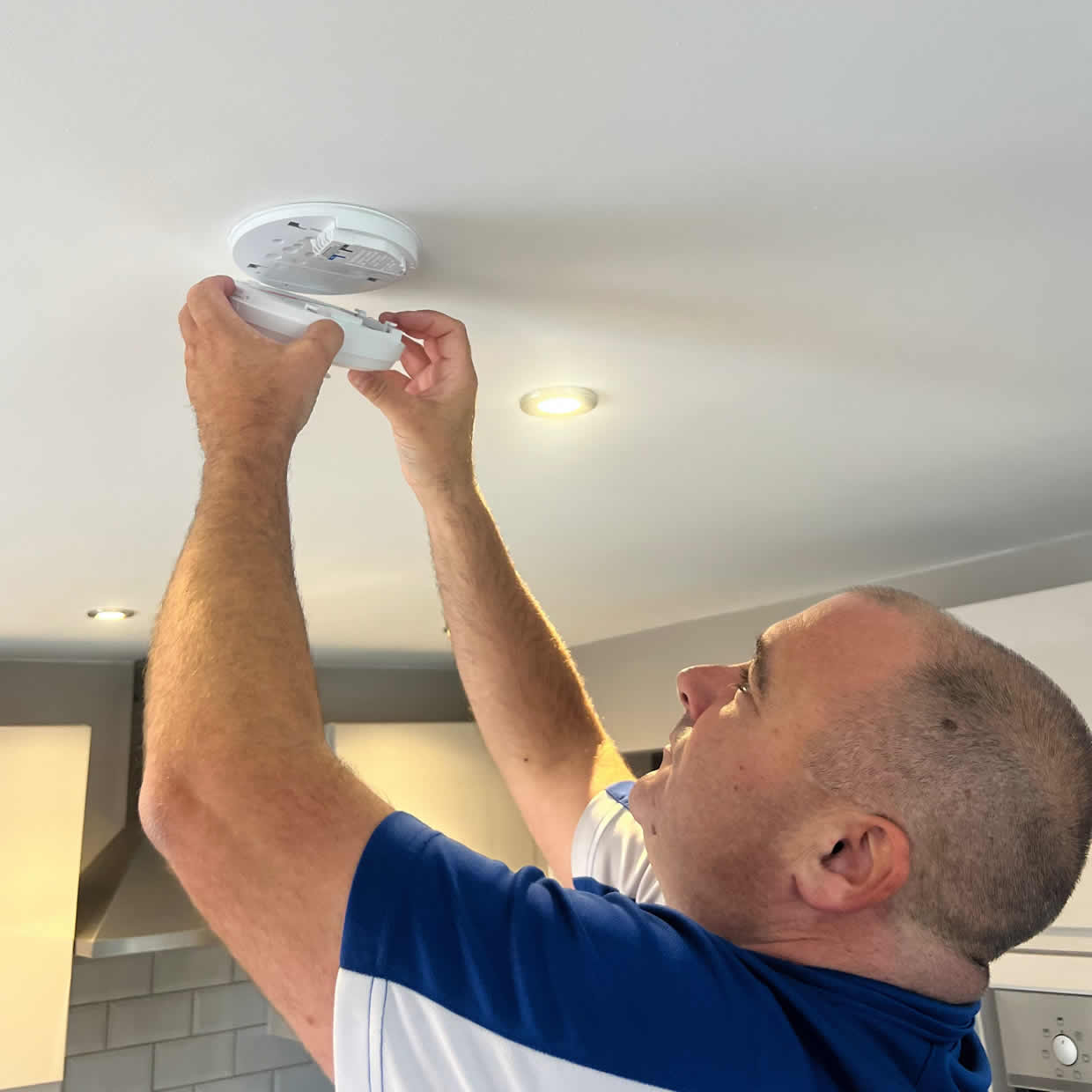 Different types of smoke and heat alarms installed in Walton-on-Thames